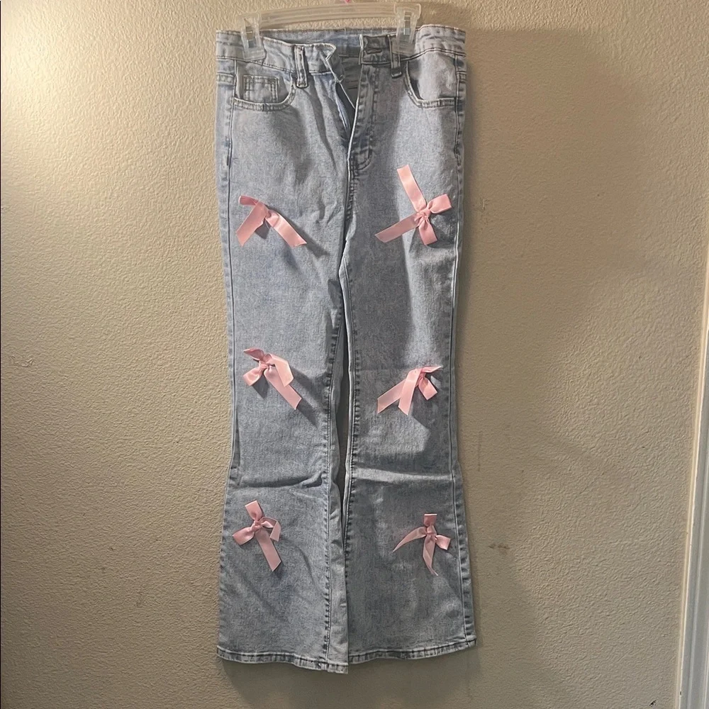 SHEIN Light Blue Jeans with Pink Bow Accents